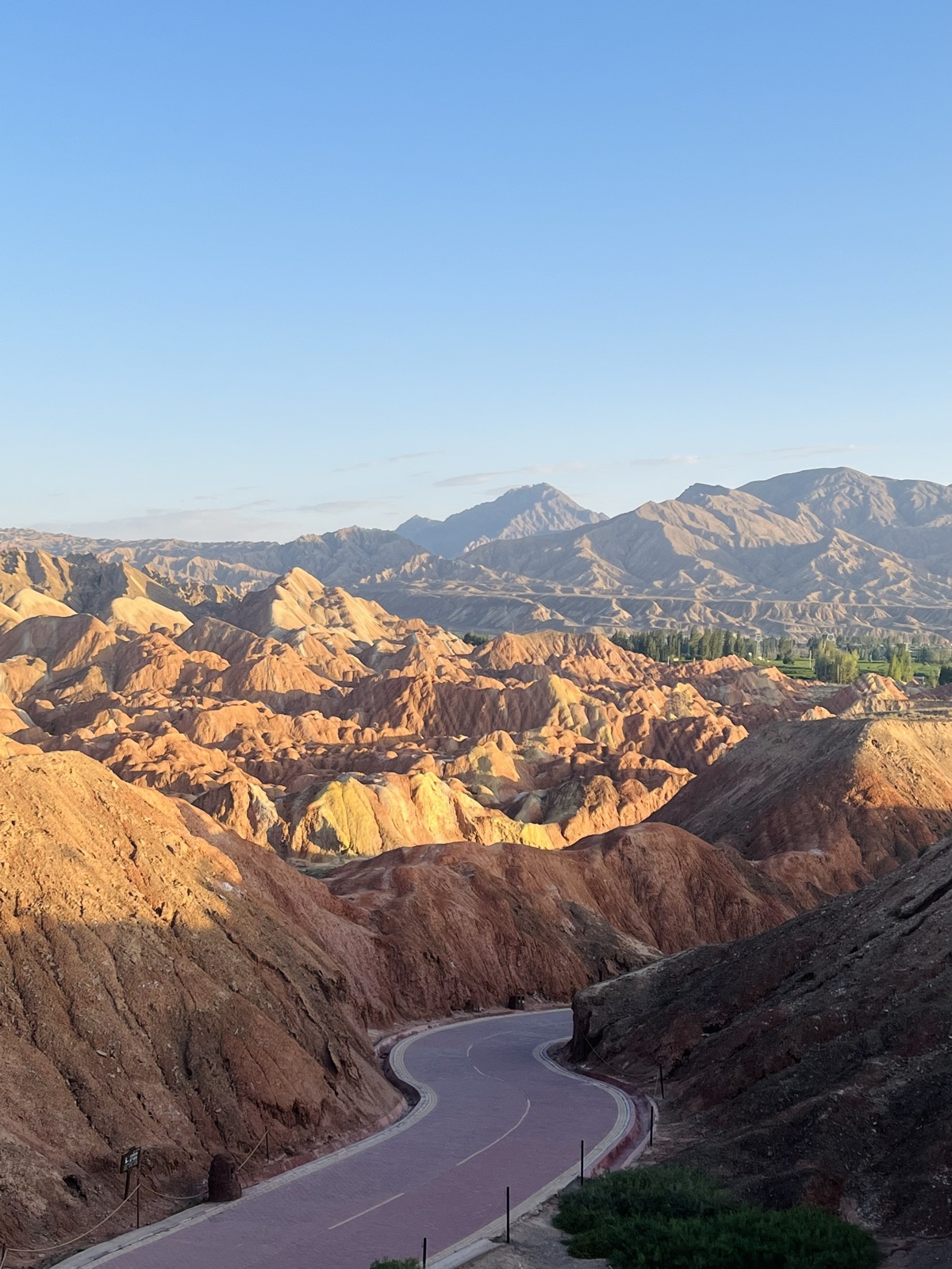 A winding road through colorful mountains in western Sichuan